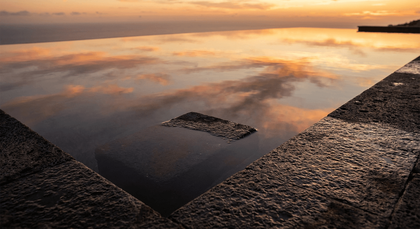 Infinity pool edge at sunset